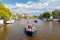 Amsterdam. Excursion boats on the canals.