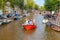 Amsterdam. Excursion boats on the canals.