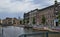 Amsterdam, Holland. August 2019. The bridges, decorated with brightly colored flowers, are a reference point for tourists to take