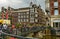 Amsterdam, Holland. August 2019. The bridges, decorated with brightly colored flowers, are a reference point for tourists to take