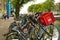 Amsterdam, Holland, August 2019. In the historic center a view that is a symbol of the city: a long line of bicycles parked along