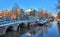 Amsterdam morning canal bridge