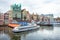 Amsterdam, Netherlands - 14.10.2019: Architecture of Damrak street of Amsterdam. Colorful old Buildings