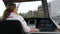 Amsterdam, Netherlands - April 22, 2019: Woman captain controls the tourist boat. Amsterdam waterway walk in evening