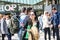 Amsterdam , Netherlands - April 31, 2017 : Asian lady taking selfies while people walking around in the streets