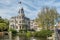 Amsterdam , Netherlands - April 31, 2017 : Typical historic building standing close to the canal