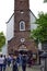 Amsterdam, Netherlands.August 2019.As soon as you enter the beguinage, the church and a crowd of tourists.Here lived women who had