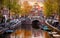 Amsterdam  Netherlands. Autumn sunset scene with scenic channels