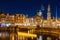 Amsterdam, Netherlands. Evening cityscape. Dark sky and city lights. Dutch canals.