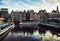 AMSTERDAM, NETHERLANDS - JANUARY 30, 2015: Beautiful views of streets, ancient buildings, boat, embankments of Amsterdam - also ca