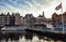 AMSTERDAM, NETHERLANDS - JANUARY 30, 2015: Beautiful views of streets, ancient buildings, boat, embankments of Amsterdam - also ca