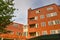 Amsterdam, Netherlands. June 2022. View of characteristic brick residential building in the style of the Amsterdam