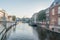 Amsterdam, Netherlands - June 6, 2019: View of Singel canal at sunset time. The Singel is a canal in Amsterdam which encircled the