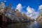 AMSTERDAM, NETHERLANDS, MARCH, 10 2018: Beautiful outdoor view Amsterdam canals with bridge and typical dutch houses