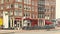 Amsterdam, Netherlands - March 2020 : Amsterdam street panorama with historical buildings, bike parking with many