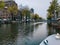 Amsterdam, Netherlands - November 01, 2019: view on the city architecture from channel boat at the autumn weather