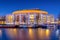 Amsterdam, Netherlands. Opera and Ballet Building. Evening cityscape. Blue sky and city lights.