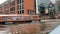 Amsterdam, Netherlands - September 2019: Cruise tourist boat with a tour on board. In the background are typical houses