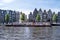 Amsterdam, Netherlands, sightseeing on lovers canalcruises boat at Holland wavy canal water