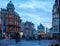 Amsterdam`s city life near the Singel canal view from Koningsplein bridge in the dusk, Netherlands