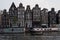 Amsterdam`s famous `crooked houses` on the canal waterfront