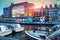 Amsterdam at sunset. Boats in the Amstel river in Amsterdam in the evening at sunset. Cityscape of the European city in summer.