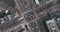 Amsterdam Weesperplein urban aerial drone footage of traffic, cars, trams, pedestrians, cyclist going through the