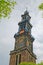 Amsterdam Westerkerk tall tower in Prinsengracht street