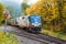 Amtrak Empire Builder in the Fall passing through the Cascade Mountains heading eastbound