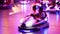 Amusement park at night city with lots of defocused bumper cars