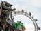 Amusement park in Prater Vienna with Wiener Riesenrad in Background