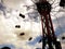 Amusement ride at the Madrid park attraction on cloudy sky background