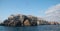 Anacapa Arch and Lighthouse with pelicans on Anacapa Island in the Channel Islands National Park offshore from Ventura California