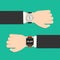 Analog watch and smart watch on businessman\'s hand