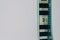 Analogue film strip in right corner with copyspace on white background