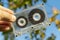 Analogue old audio cassette in hand