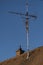 Analogue television antenna on the roof of a house vintage