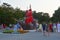 Anapa, Russia, July, 11, 2018. People walking on the promenade next to the sailboat `Scarlet sails` in the evening on Anapa resort