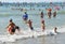 Anapa, Russia, July, 18, 2018. A lot of people on the city beach of the Black sea in Anapa. Children swimming in the waves near th