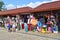 Anapa, Russia, July, 18, 2018. People walking near small pavilions with beach accessories, clothes and Souvenirs on the promenade