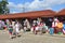 Anapa, Russia, July, 18, 2018. People walking near small pavilions with beach accessories, clothes and Souvenirs on the promenade