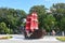 Anapa, Russia, July, 18, 2018. People walking on the promenade next to the sailboat `Scarlet sails` on Anapa resort in sunny day