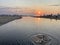 Anapa, Russia, July. 25, 2019. Child bathing in the river Anapka at sunset in Anapa