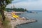 Anapa, Russia. Malaya Bay in Anapa resort. People rest on stony beach of Black Sea on Malaya Bukhta sanatorium