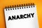 Anarchy - society being freely constituted without authorities or a governing body, text concept on notepad