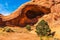 Anasazi cave dwellings built in a sandstone cliff in Monument Valley