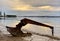 An anchor in a bay between islands during a sunrise storm near Brisbane, Australia