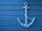 Anchor wooden blue background