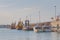 Anchored fishing boats and tugboats in port of Bari Italy