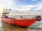 Anchored longtail boat on the coast of the Andaman Sea in Thailand